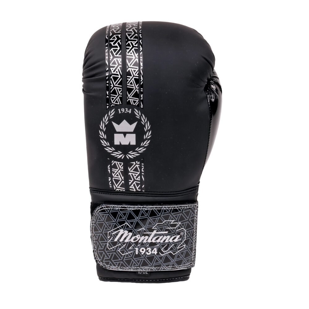 Gant de boxe noir Montana GHOST BlackCode vu de dos, montrant le bandeau graphique blanc et le blason à la couronne Montana 1934 sur la surface de frappe.