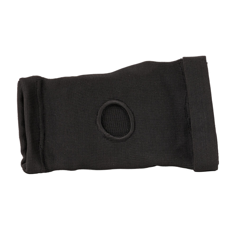 Protège-coude noir Montana ELBOWGUARD posé à plat, montrant l’ouverture centrale qui dégage l’articulation et la coupe préformée.