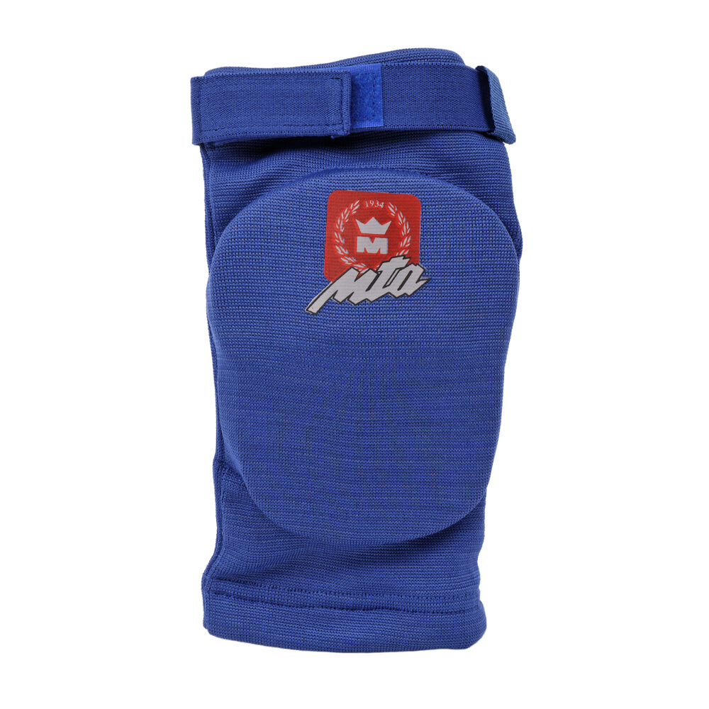 Protège-coude bleu Montana ELBOWGUARD vu de face, montrant le coussin de mousse dense qui couvre la pointe du coude et le blason rouge MTA.