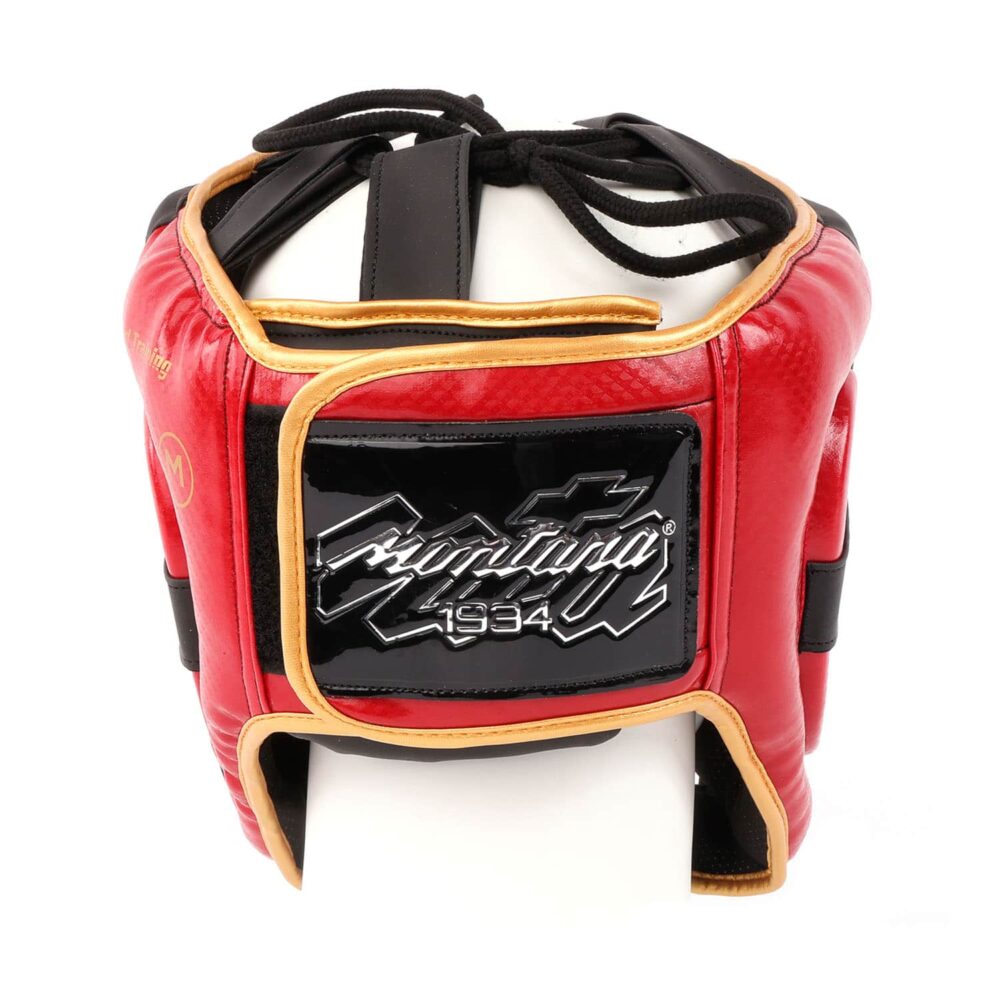 Casque de boxe noir à l'avant et rouge à l'arrière de la marque Montana FULLGUARD Training, conçu pour l'entraînement, avec système SMART LOCK, mousse EVA et ajustement supérieur précis.