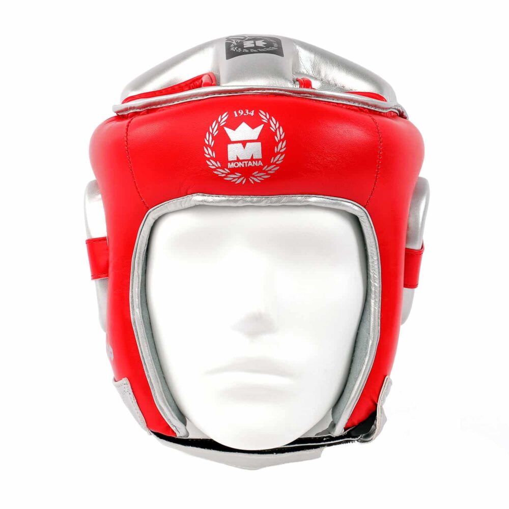 Casque de boxe rouge Montana HELMET TFK, en vue frontale, mettant en avant la symétrie de la coque et la découpe faciale optimisée, idéale pour allier protection et performance dans les sports de combat.