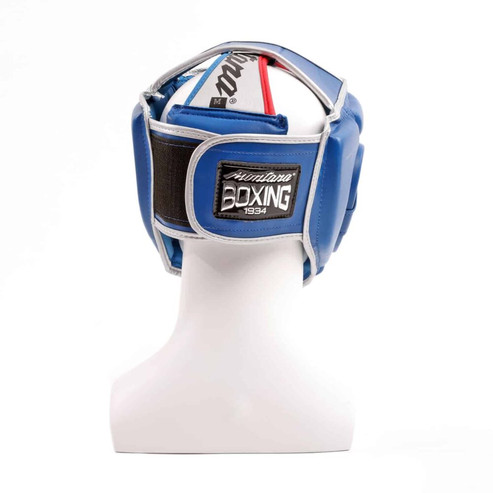 Casque de boxe bleu Montana AMATEUR, conforme aux normes de compétition, en PolyComposite léger avec mousse EVA, offrant un champ de vision intégral pour la boxe anglaise ou le full-contact.