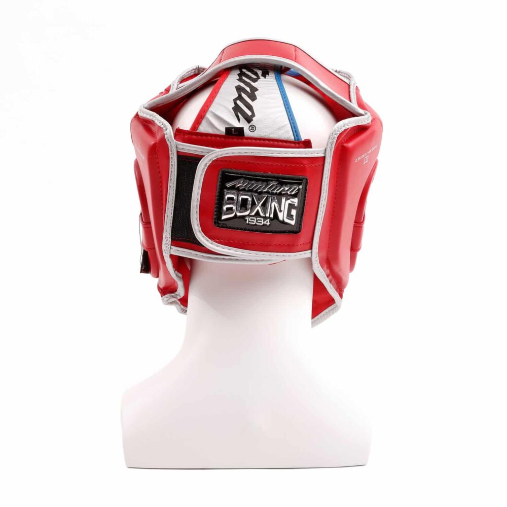 Casque de boxe rouge Montana AMATEUR en mousse EVA articulée, offrant une protection frontale et latérale sans compromis sur la visibilité, conçu pour les compétitions.