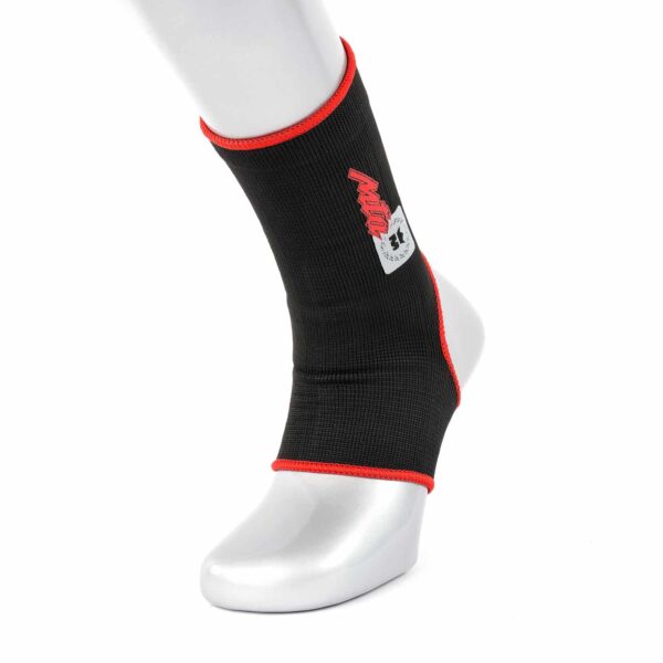 Chevillère traditionnelle MONTANA M75 noire, en coton élastique avec talon ouvert, pour maintien articulaire léger et confort quotidien.
