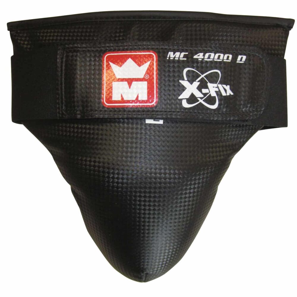 Coquille de protection MONTANA MC4000 X-Fix noire, monocoque anatomique, conçue pour les entraînements semi-pros. Système de serrage précis et maintien optimal.