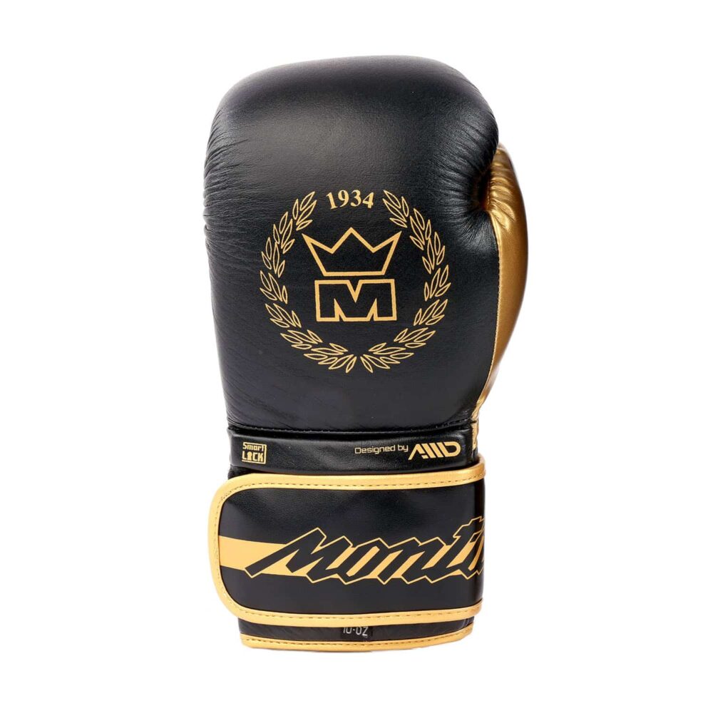 Gants de boxe noirs Montana VICTORY NewCode adaptés à la pratique de la boxe anglaise, boxe thaï, full contact, kick boxing et muay thaï, avec mousse injectée protectrice et design classique en cuir.