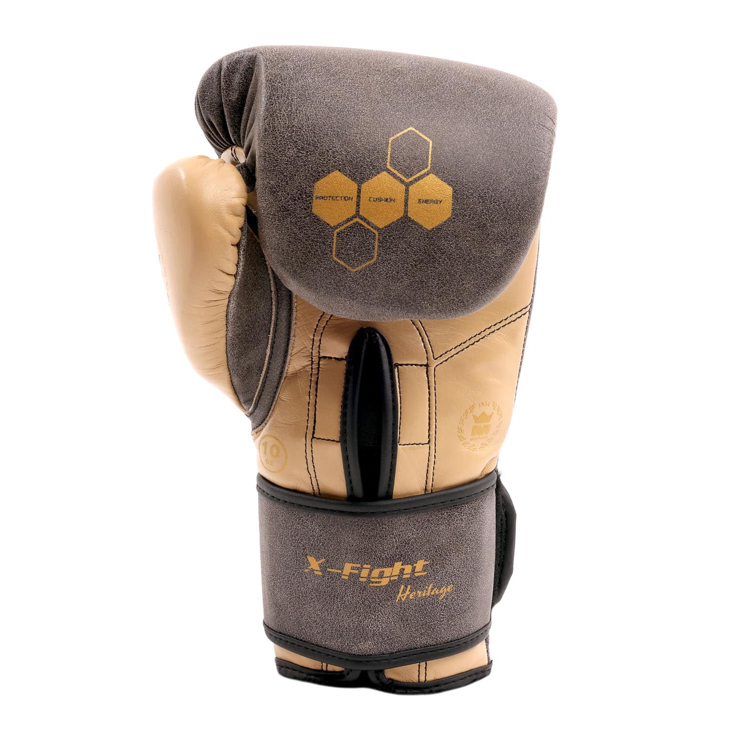 Gants de boxe marron Montana X-FIGHT Heritage adaptés aux disciplines multiboxes comme le kick boxing, la boxe anglaise et le Muay Thai, avec renforts hexagonaux et système Roll Gripp’ favorisant la fermeture du poing.