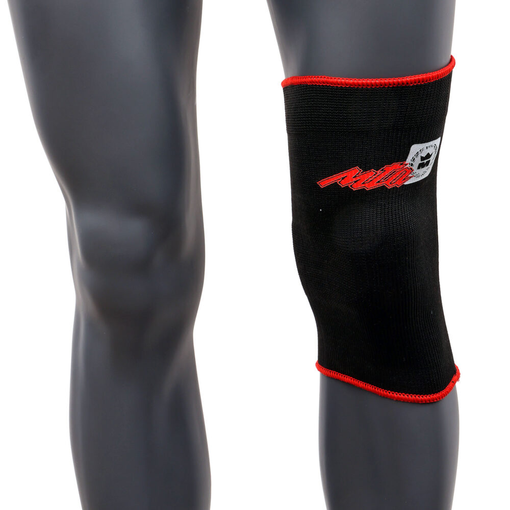 Genouillère en coton noir M95, maintien souple pour les entraînements légers ou la récupération, matière élastique et respirante.