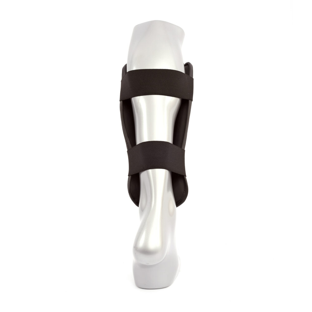 Protège tibias MK20 noirs en PolyComposite, mousse dense, doublure antibactérienne et ajustement scratch, parfait pour l'entraînement et la compétition, certifié CE.