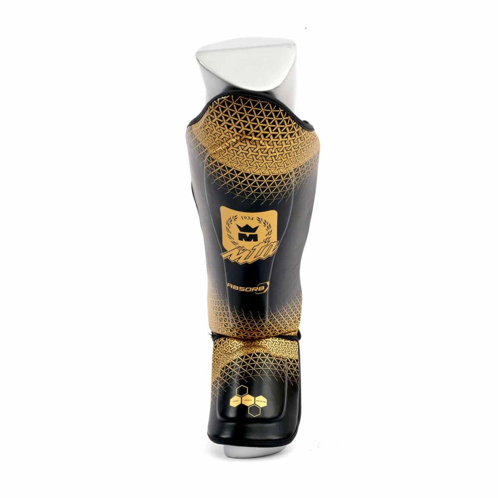 Protège tibias Montana noir et jaune MK PROTECT NewCode avec insert Absorb, confort antibactérien et mousse dense pour une protection maximale lors des combats, homologué CE.