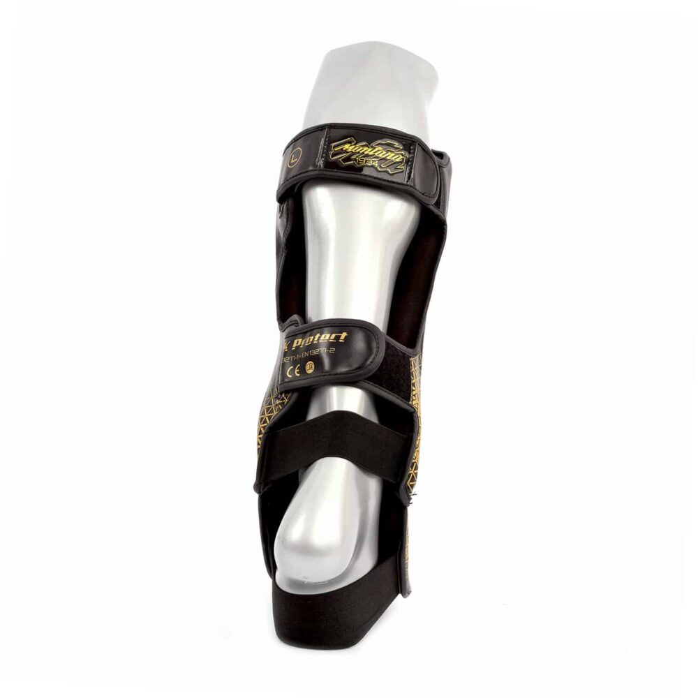 Protège tibias Montana noir et jaune MK PROTECT NewCode avec insert Absorb, confort antibactérien et mousse dense pour une protection maximale lors des combats, homologué CE.