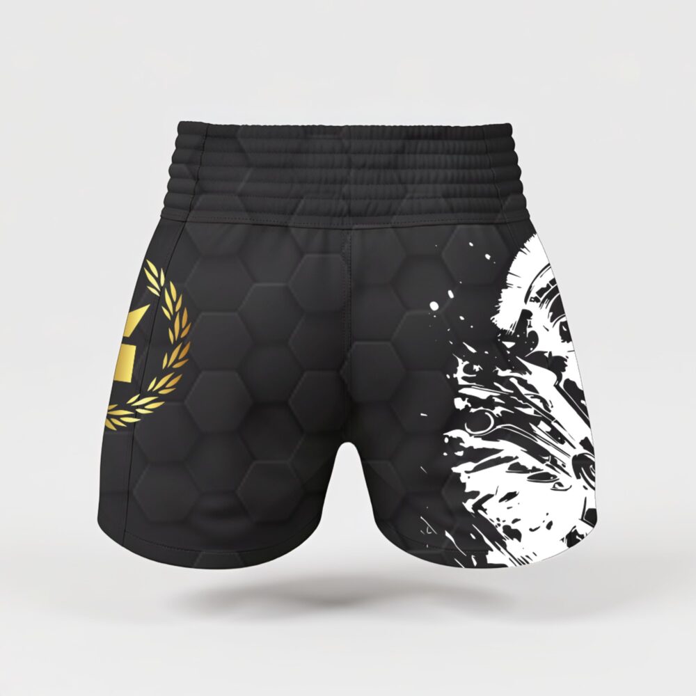 Short de boxe noir Montana MULTIBOX Spartiate vu de dos, montrant la large bande élastique de ceinture et le motif spartiate reporté sur l'arrière des jambes.